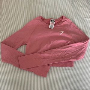 Pink gymshark cropped long sleeve workout top